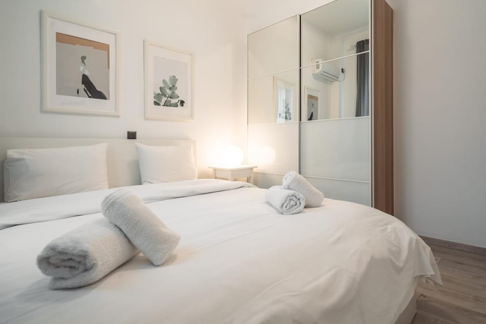 Bed, Decorative detail, Bedroom, towels, wardrobe, air conditioner