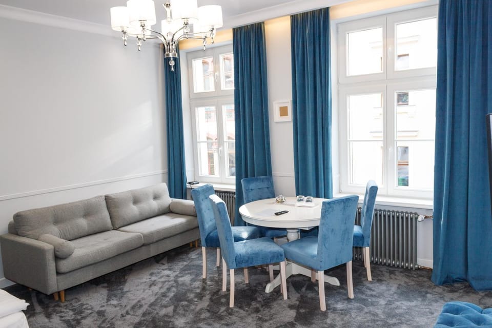 Property building, Living room, Seating area, Dining area