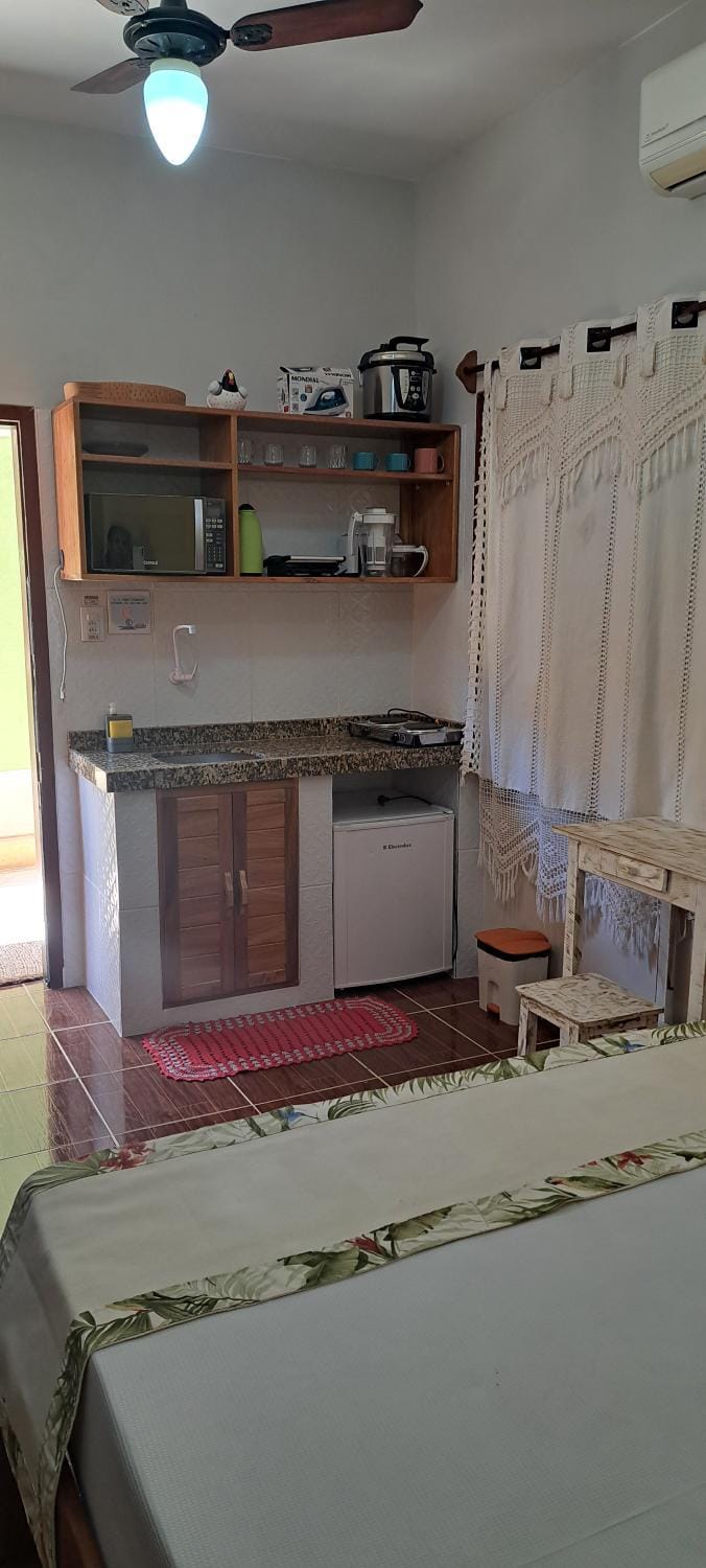 Kitchen or kitchenette, minibar, oven, stove, air conditioner