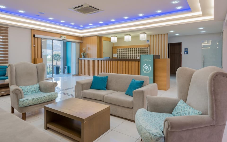 Property building, Facade/entrance, Property logo or sign, Living room, Lobby or reception, Lounge or bar, Seating area, Area and facilities