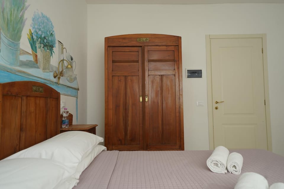 Bed, Photo of the whole room, Bedroom, towels, wardrobe