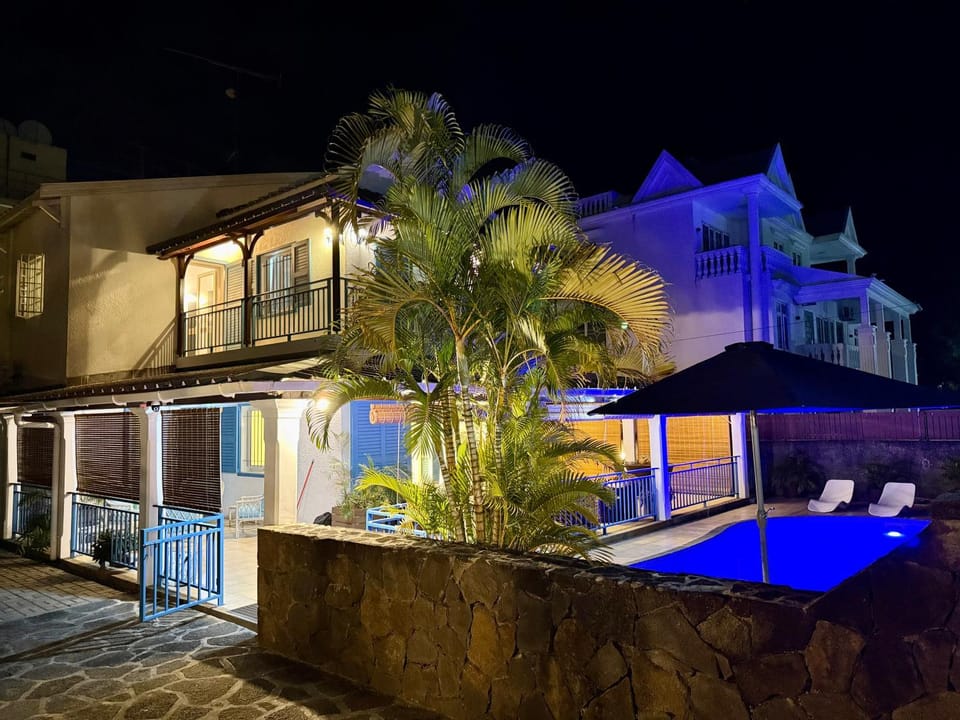 Property building, Night, Pool view, Swimming pool, sunbed