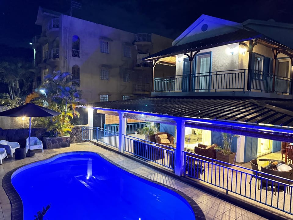 Property building, Patio, Night, View (from property/room), Balcony/Terrace, Swimming pool