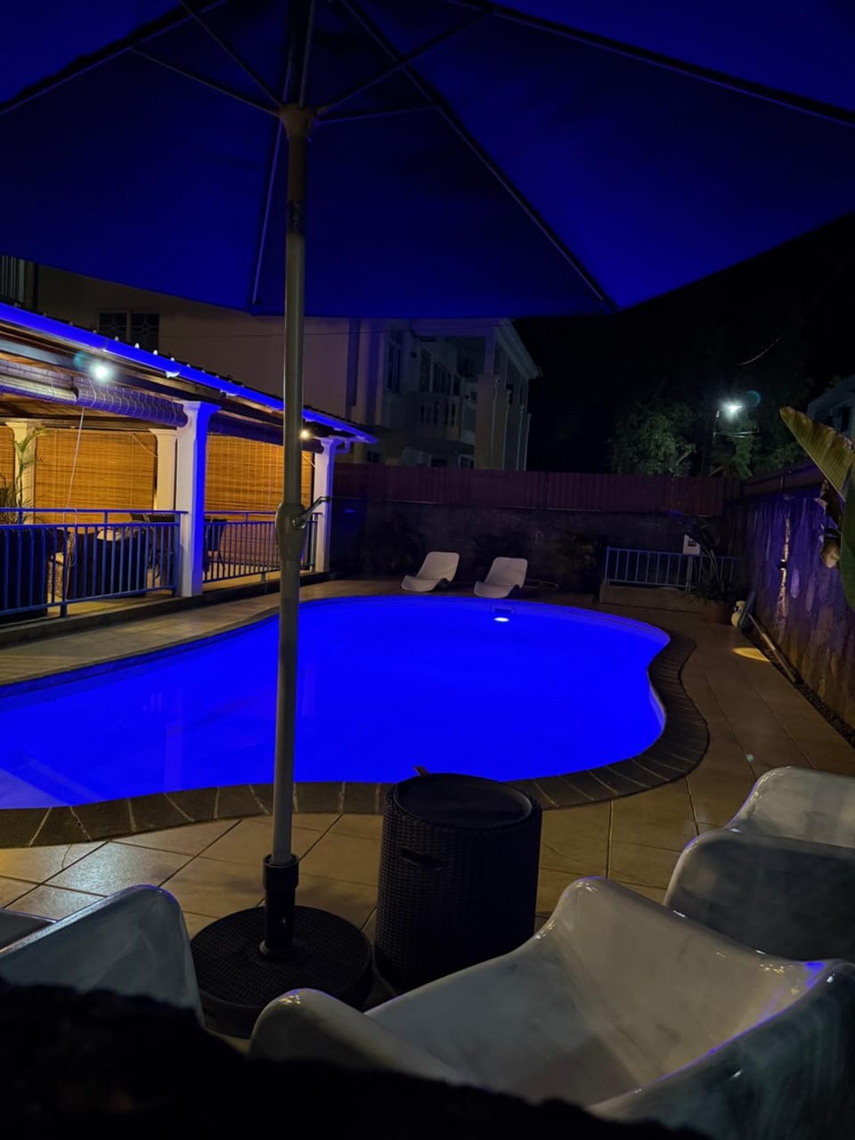 Property building, Patio, Night, Pool view, Swimming pool, sunbed
