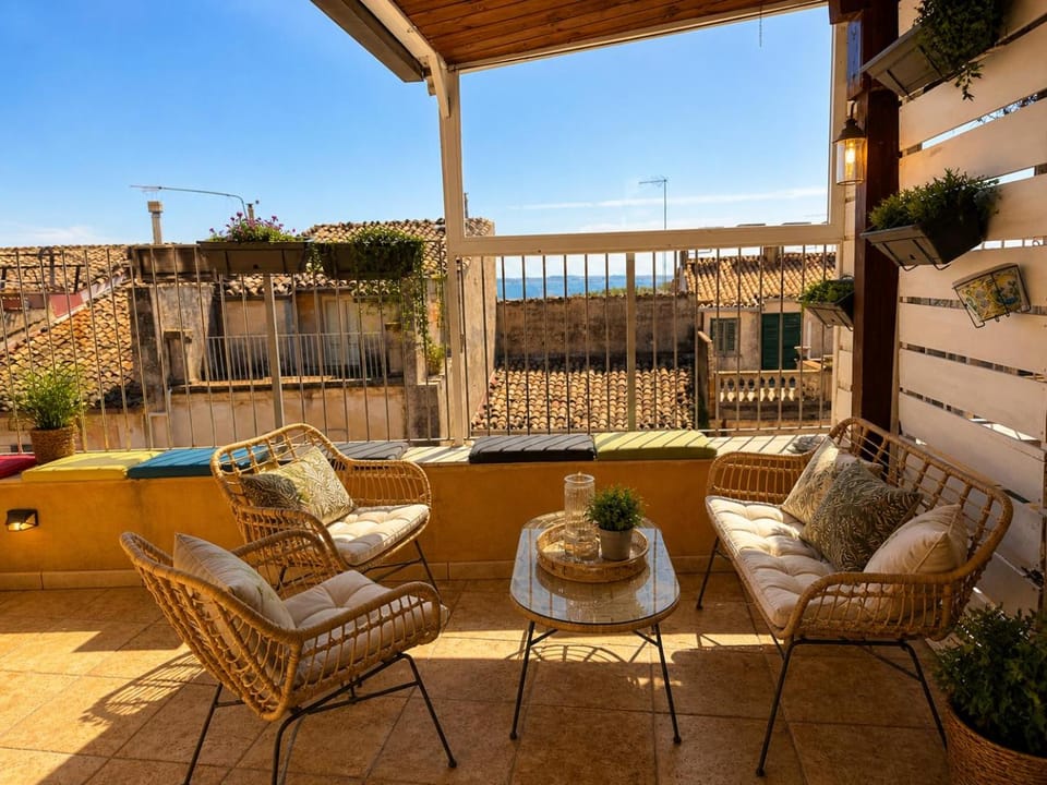 Property building, Patio, Day, View (from property/room), Balcony/Terrace, Living room, Seating area, Dining area, sunbed