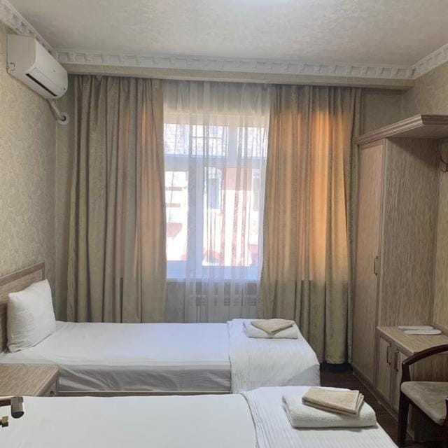 Bed, Photo of the whole room, Bedroom, towels, air conditioner