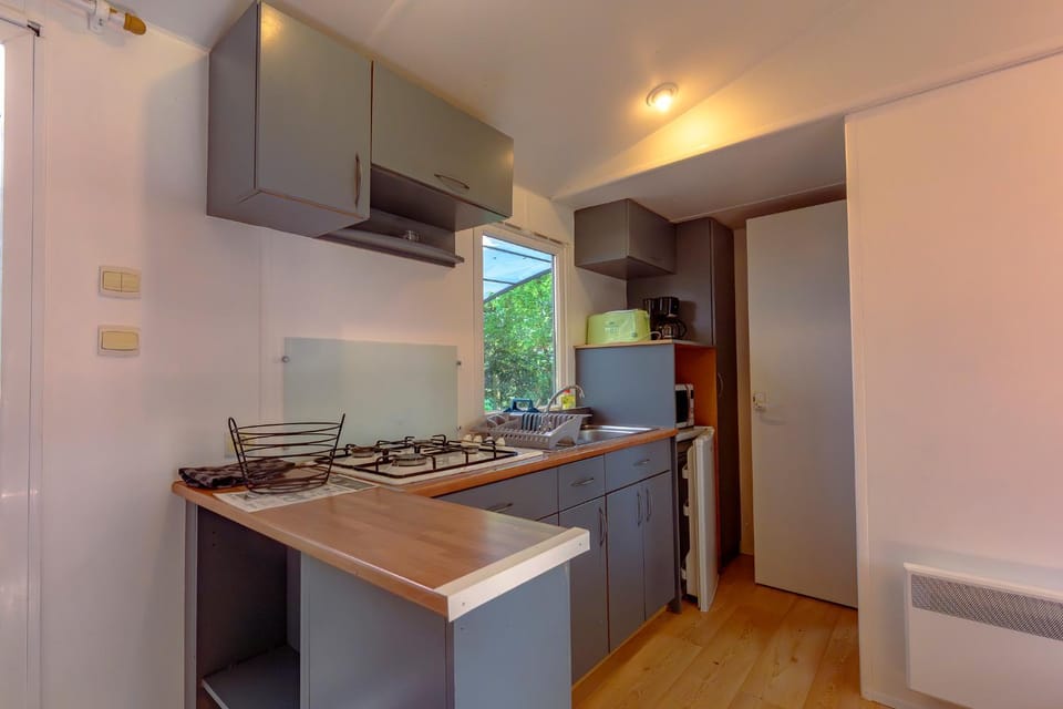 Kitchen or kitchenette, stove