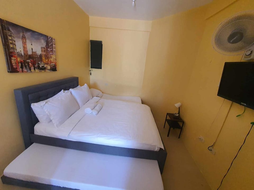 Lucena Meg's Studio Apmnt Deluxe rm-Near SM-Wifi Apartment in Calabarzon