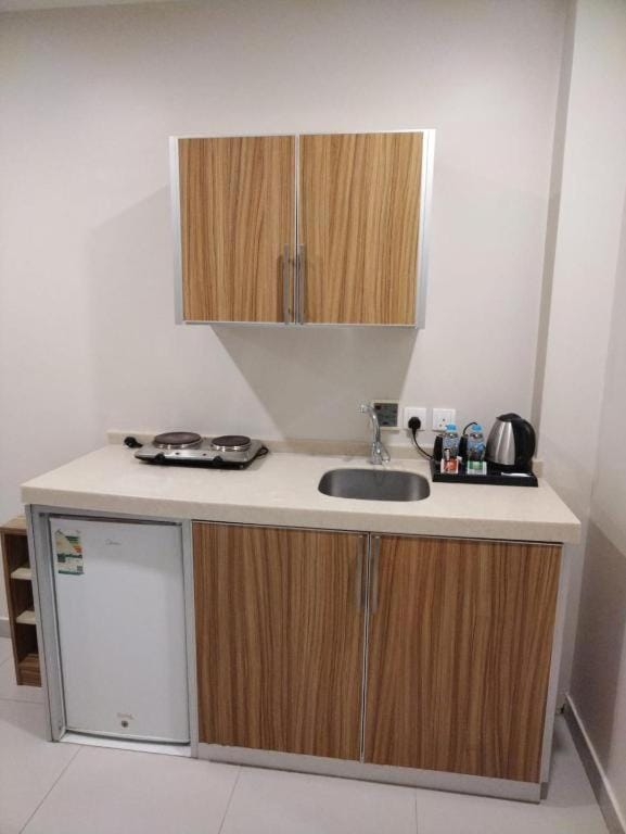Kitchen or kitchenette, stove
