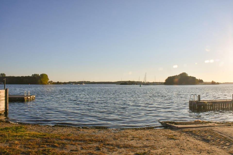 Villa Maroma Regal Veerse Meer gratis 4 E-bikes gratis laden EV trampoline Villa in Kamperland