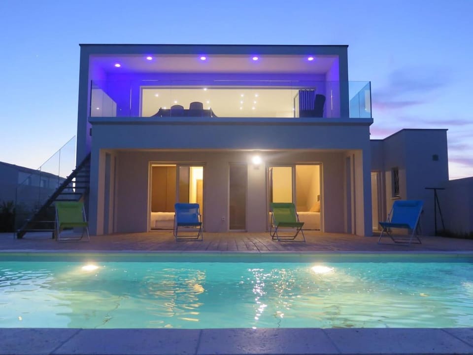 Property building, Night, Pool view, sunbed