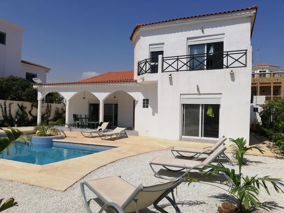 Property building, Patio, Swimming pool