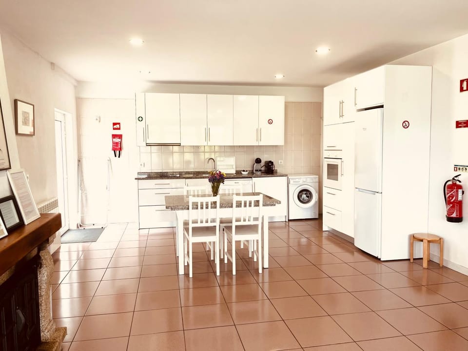 Kitchen or kitchenette, Dining area, dishwasher, stove, washing machine