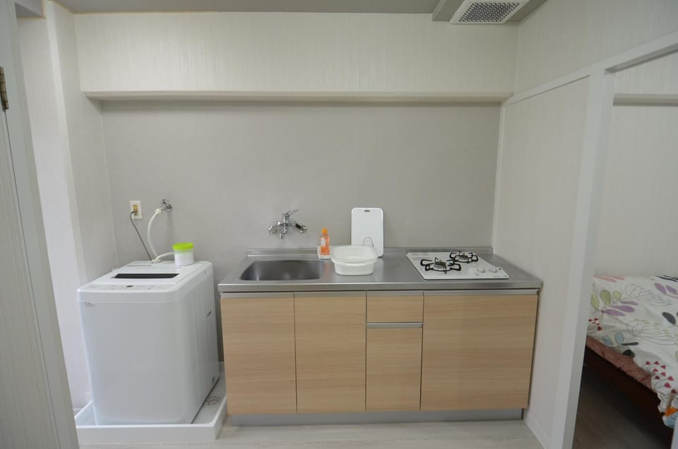 Comfort CUBE PHOENIX MIYAZAKI Apartment in Japan