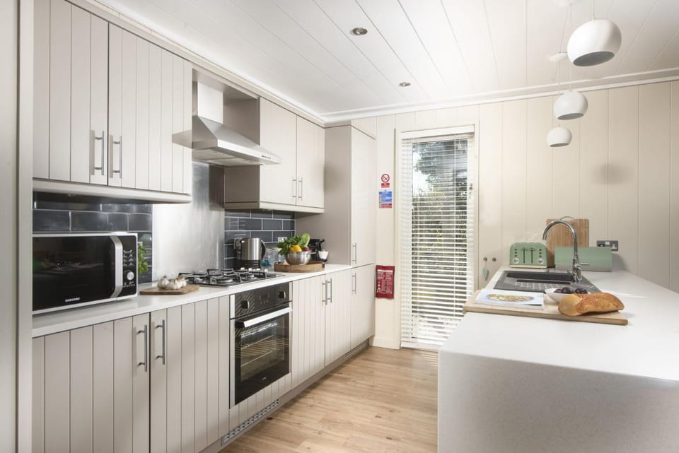 Kitchen or kitchenette, oven, stove, toaster