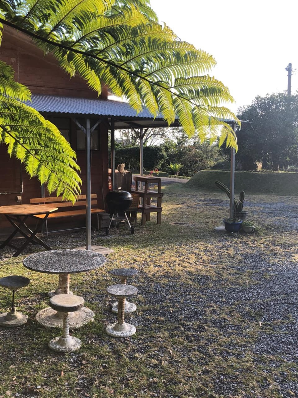 Property building, BBQ facilities, Seating area, Garden view