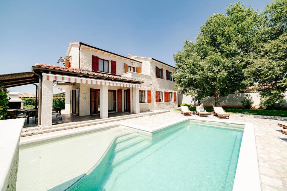 Property building, Patio, Pool view, Swimming pool, sunbed