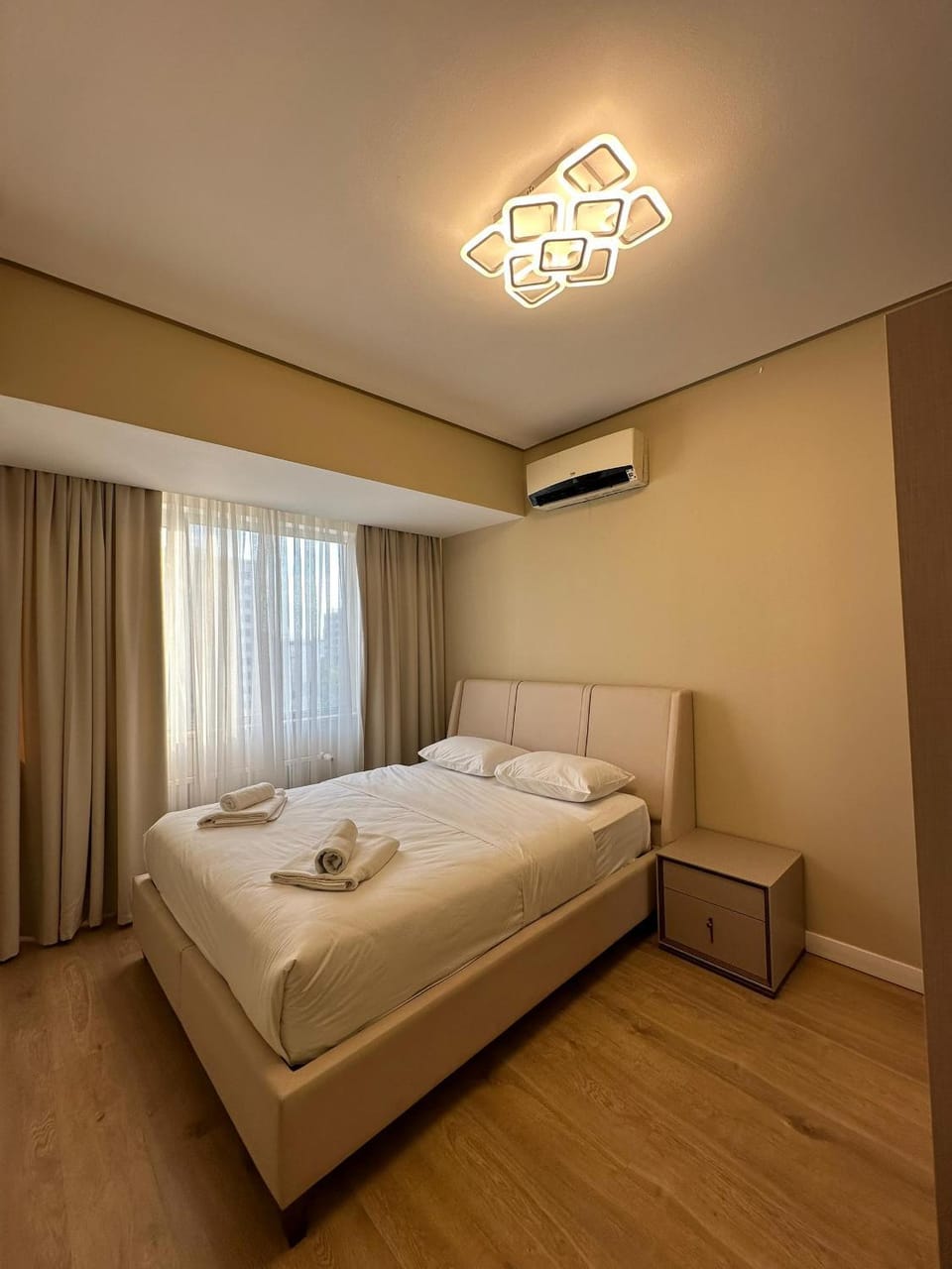 Bedroom, towels, wardrobe, air conditioner