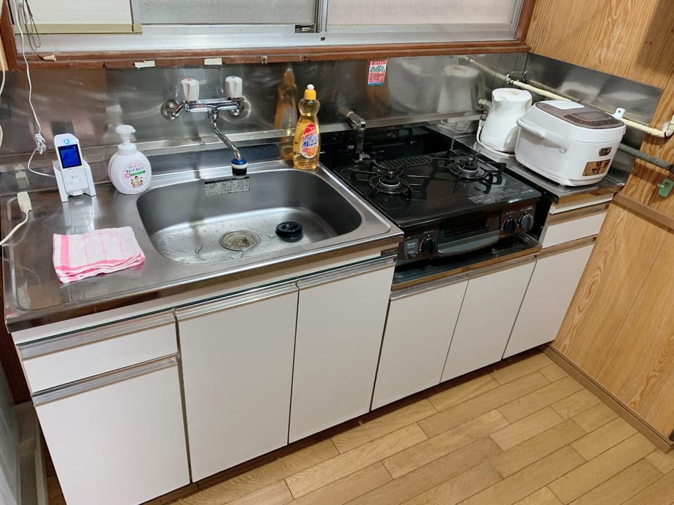 Kitchen or kitchenette, stove