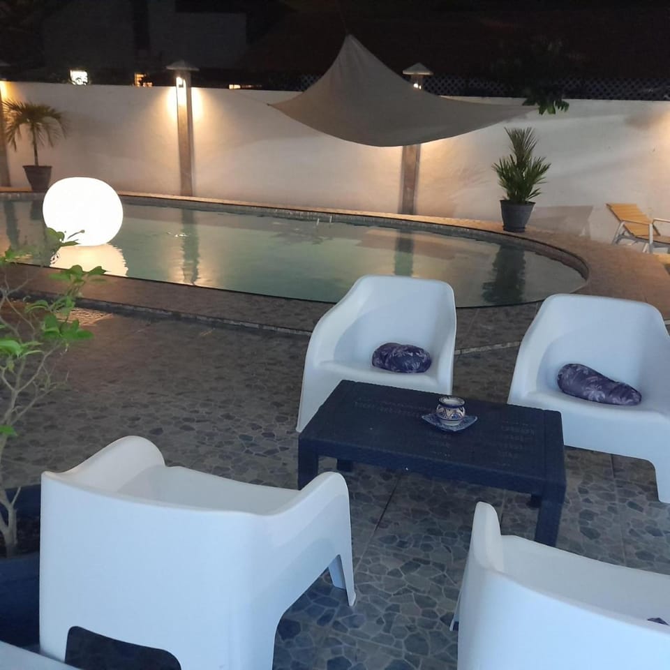 Night, Seating area, Pool view