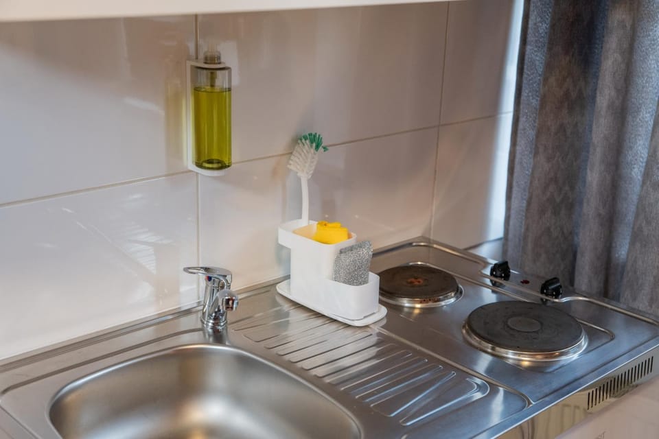 Kitchen or kitchenette, stove