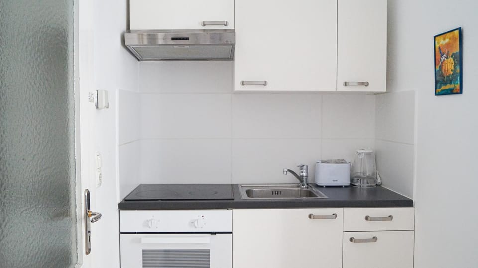 Kitchen or kitchenette, stove