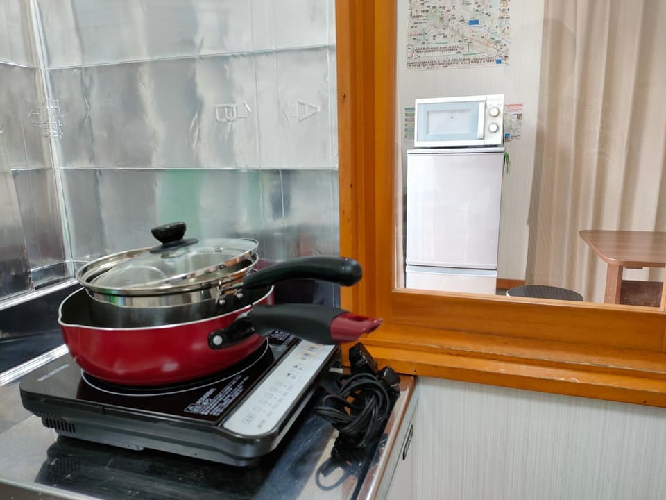 Kitchen or kitchenette, stove