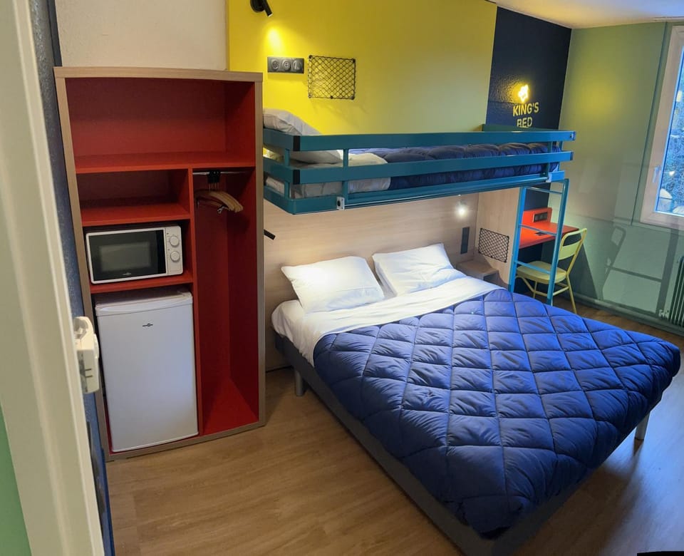 Bed, Photo of the whole room, Bedroom, bunk bed, microwave, wardrobe