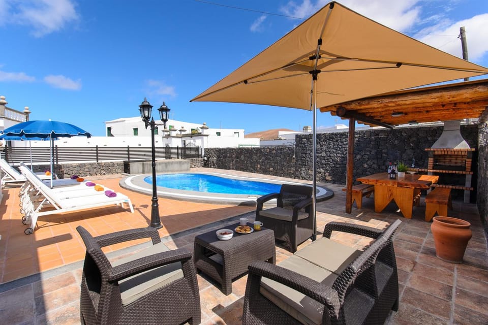 Property building, Living room, Swimming pool