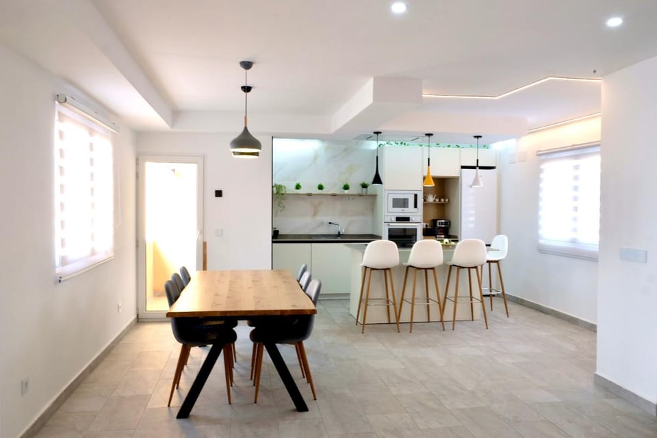 Kitchen or kitchenette, Dining area, stove, laundry, washing machine, dryer, kitchen