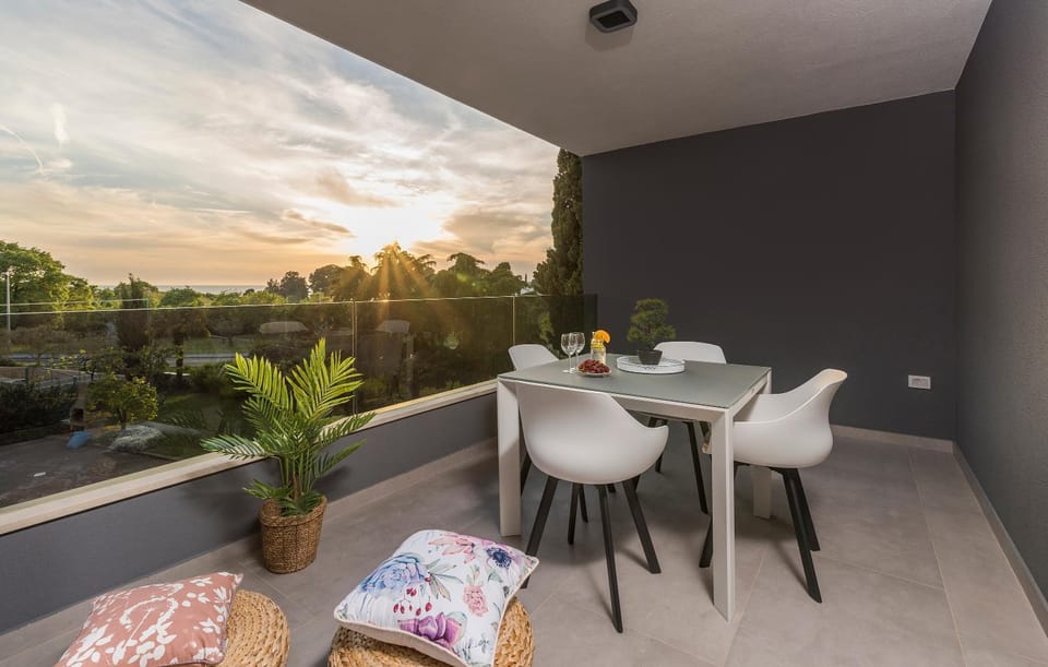 View (from property/room), Balcony/Terrace, Seating area, Sea view, Sea view, Sunset