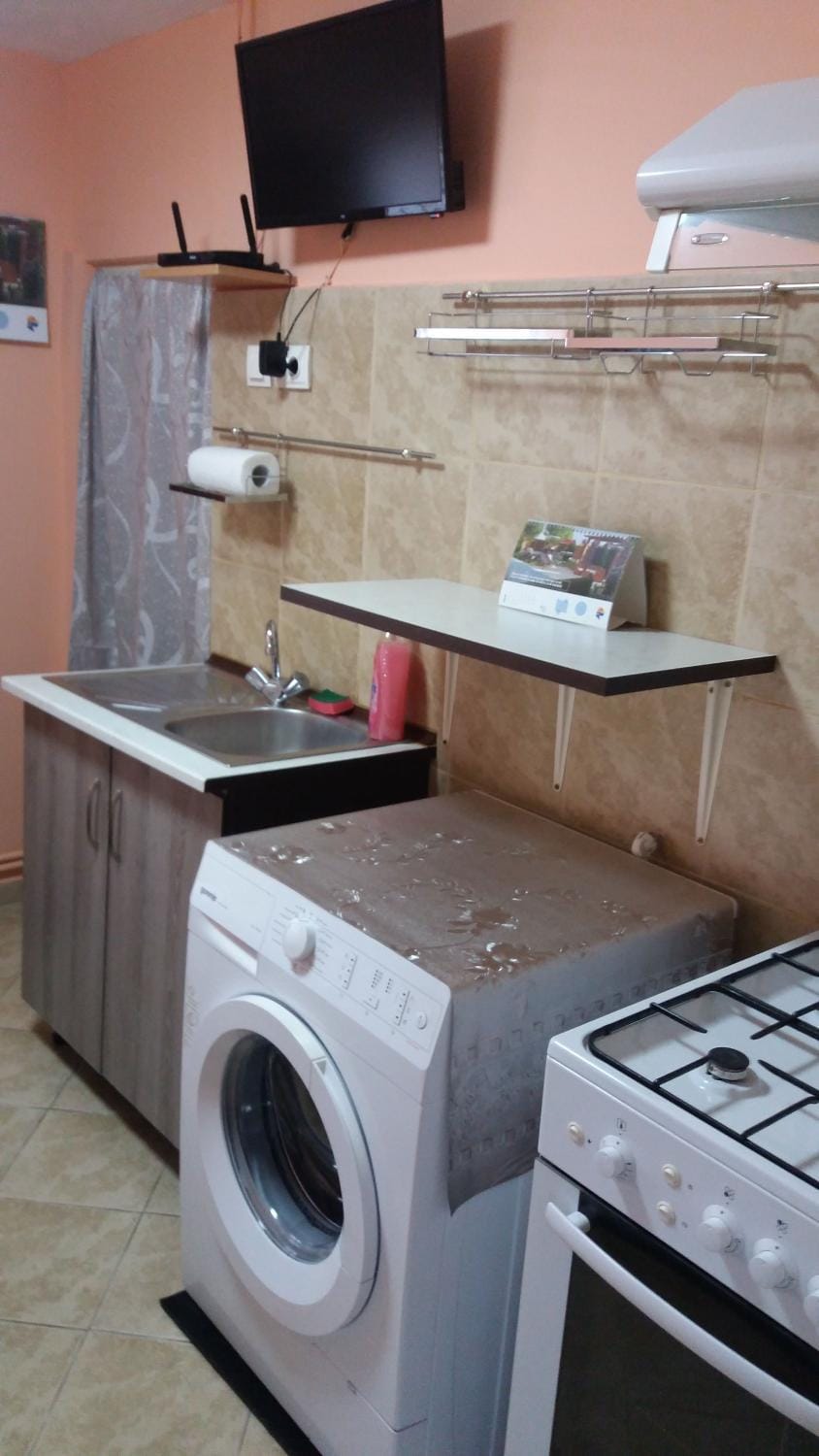 Kitchen or kitchenette, washing machine
