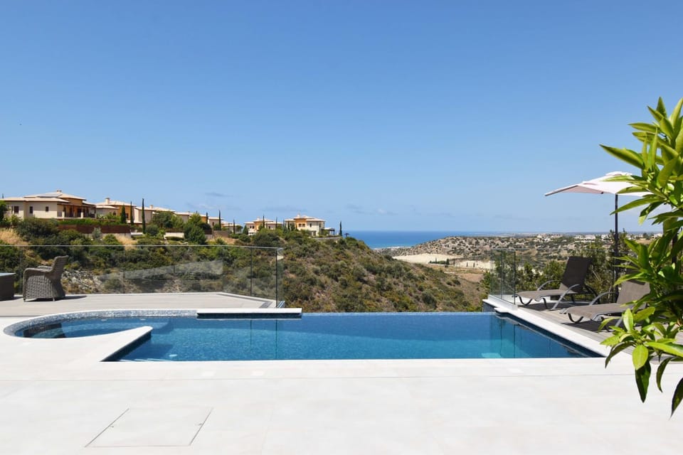 View (from property/room), Balcony/Terrace, Seating area, Pool view, Sea view, Swimming pool