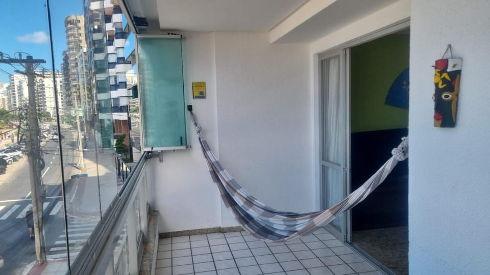 Apartamento BEIRA MAR VISTA TOTAL - SENSAÇÃO DE CASA TÉRREA A BEIRA MAR - COZINHA EQUIPADA -AIR FRYER -ÁREA DE CHURRASCO PRIVATIVA- TVS SMART- DISNEY PLUS E OUTROS-PRAIA IDEAL PARA CRIANÇAS-ROUPA DE CAMA PARA 2 X CASAIS -KIT PRAIA 4 PESSOAS Apartment in Guarapari
