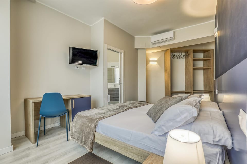 Bed, TV and multimedia, wardrobe, air conditioner