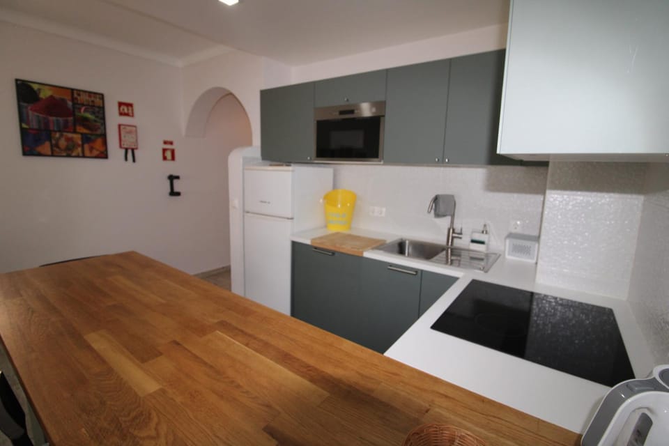 Kitchen or kitchenette, oven, stove
