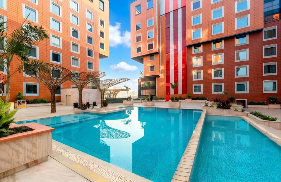 Property building, Day, Pool view, Swimming pool, sunbed