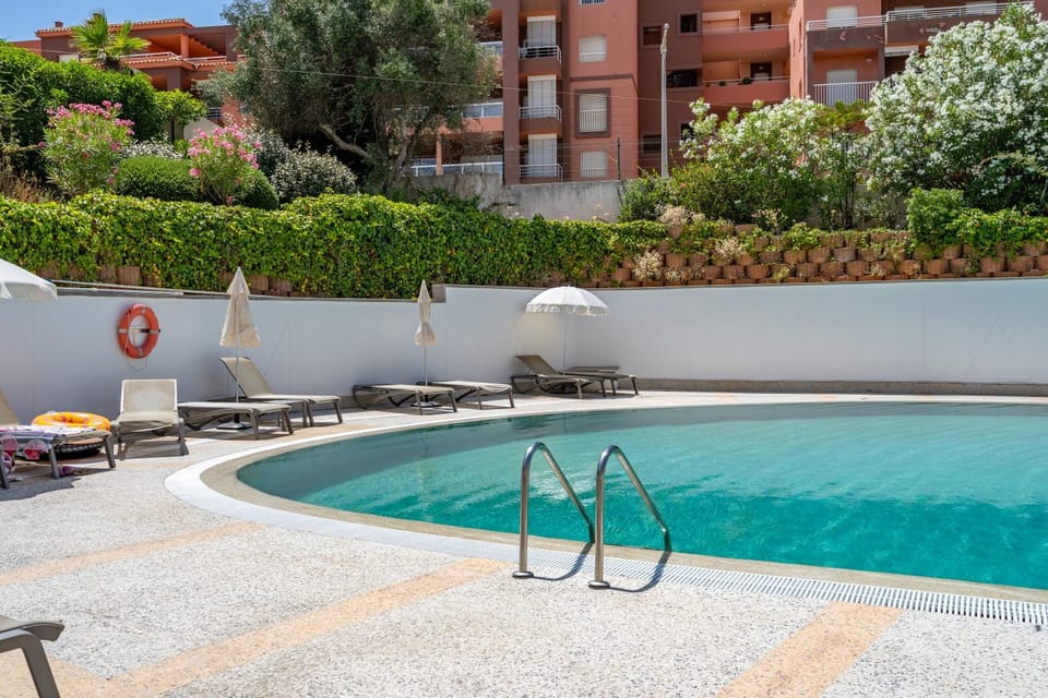 Property building, Patio, Pool view, Swimming pool, sunbed