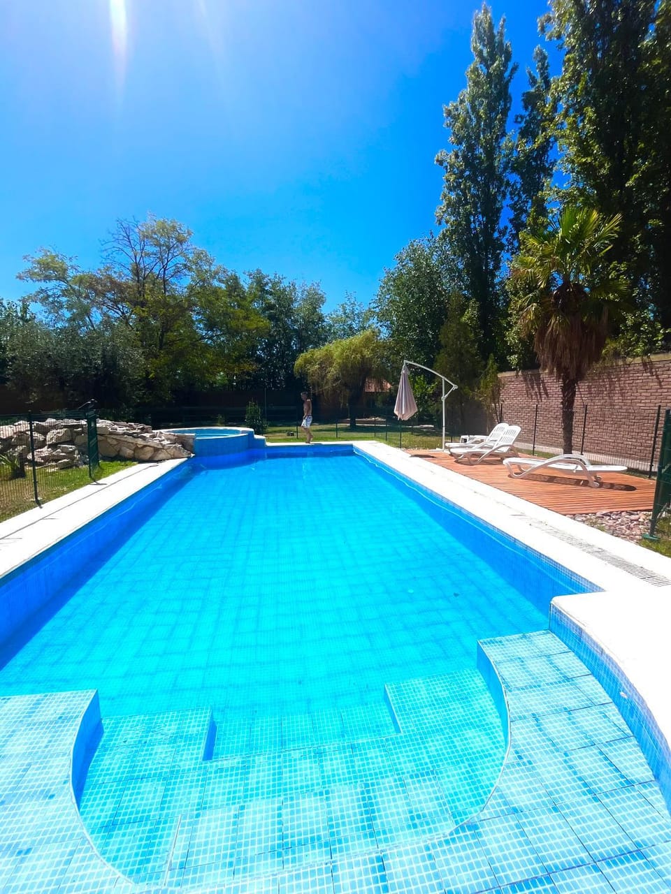Swimming pool, sunbed