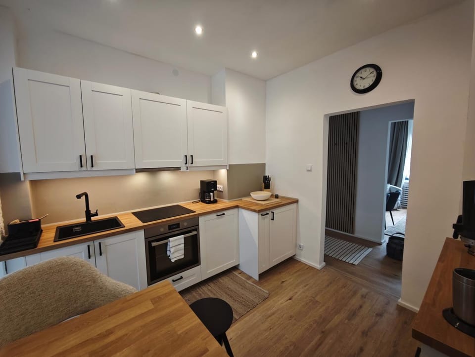 Kitchen or kitchenette, oven, stove