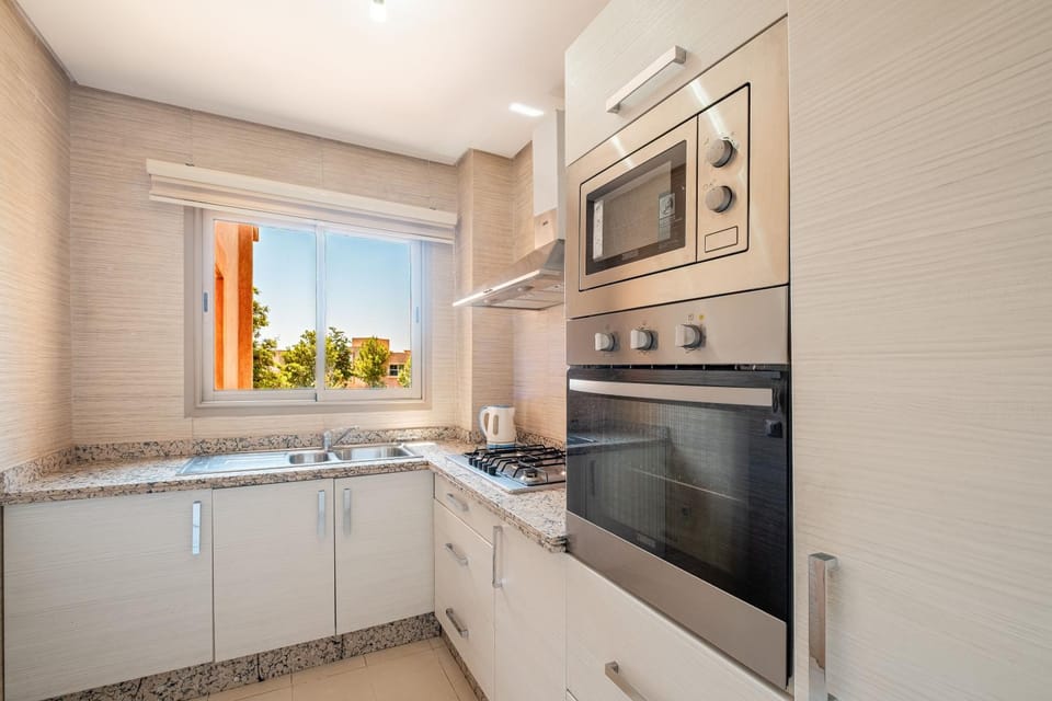 Kitchen or kitchenette, oven, stove
