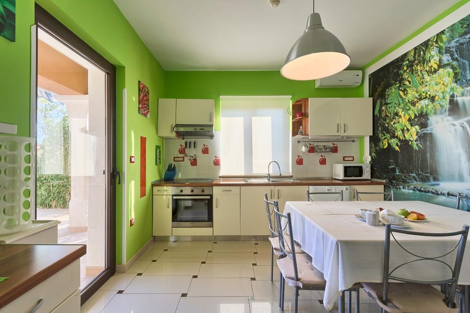 Kitchen or kitchenette, dishwasher, oven, stove, toaster