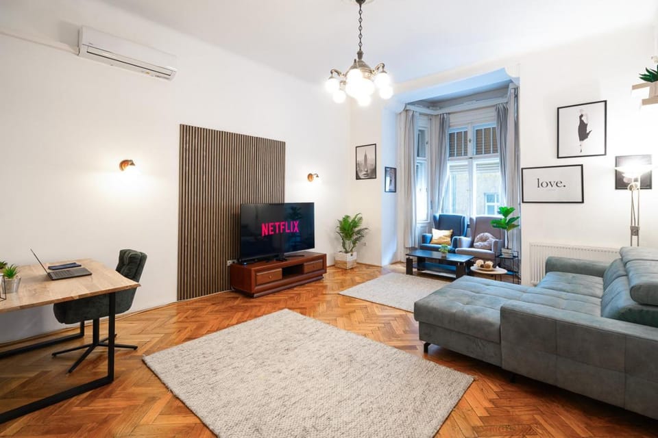 Place of worship, TV and multimedia, Living room, Seating area, air conditioner