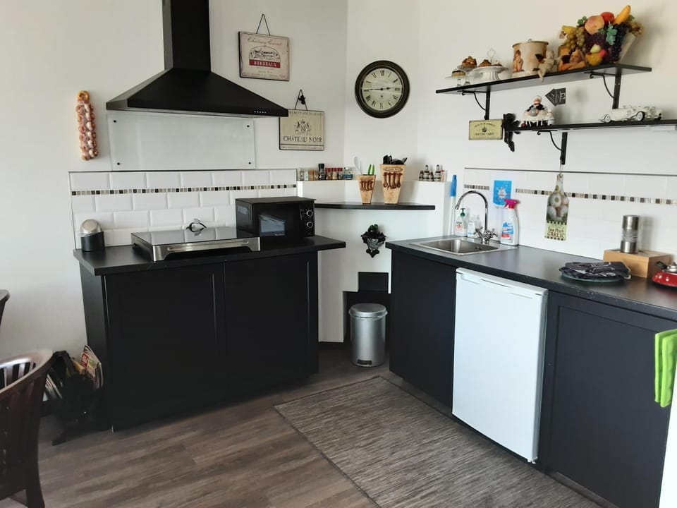 Kitchen or kitchenette, stove