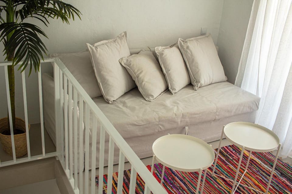 Bed, Living room, Seating area