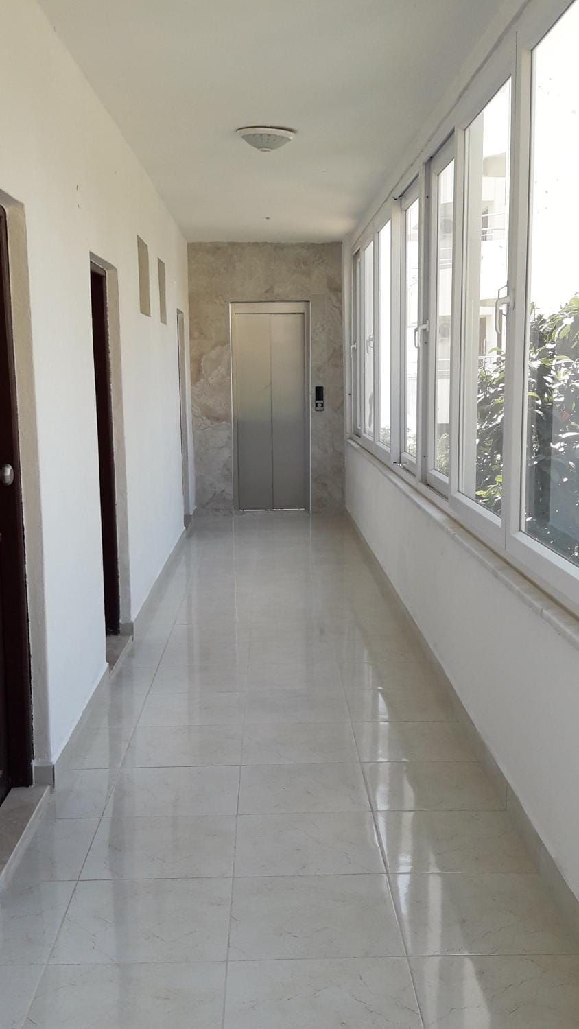 Property building, elevator