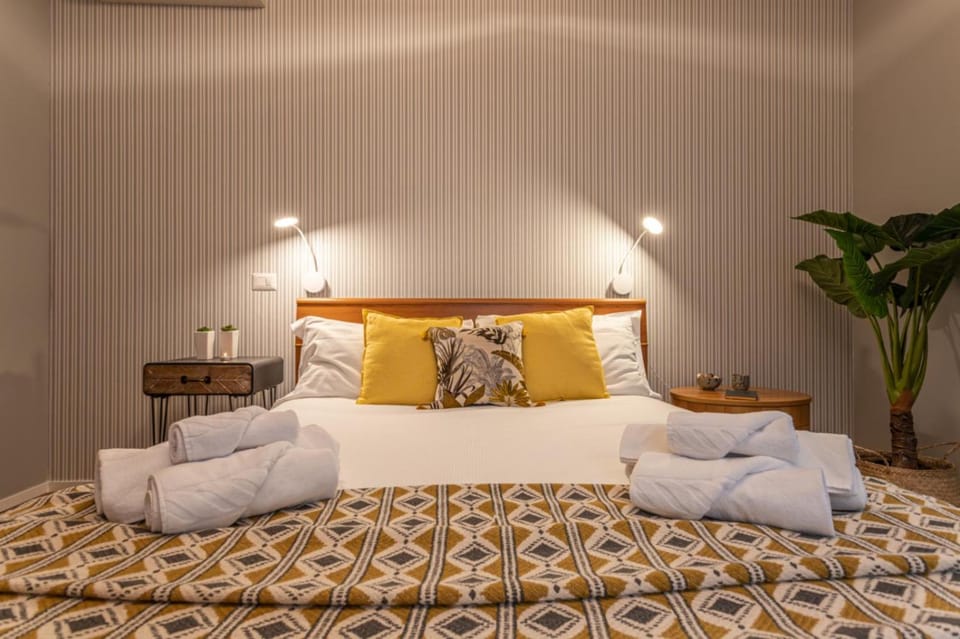 Bed, Living room, Seating area, Bedroom