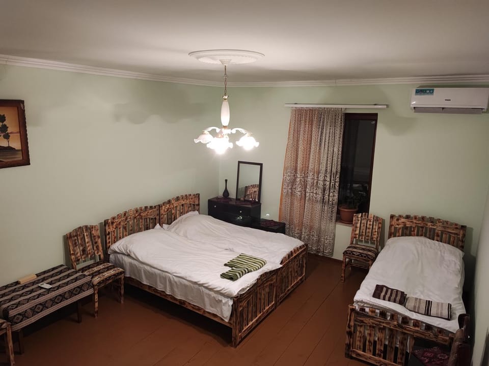 Bed, Photo of the whole room, Bedroom, towels, air conditioner