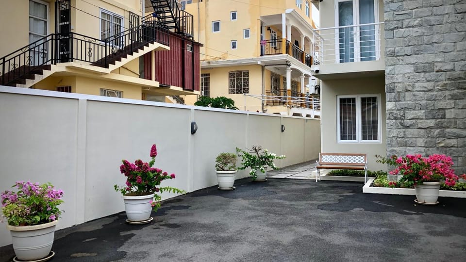 Property building, Patio, Facade/entrance, Balcony/Terrace, Garden view, Inner courtyard view