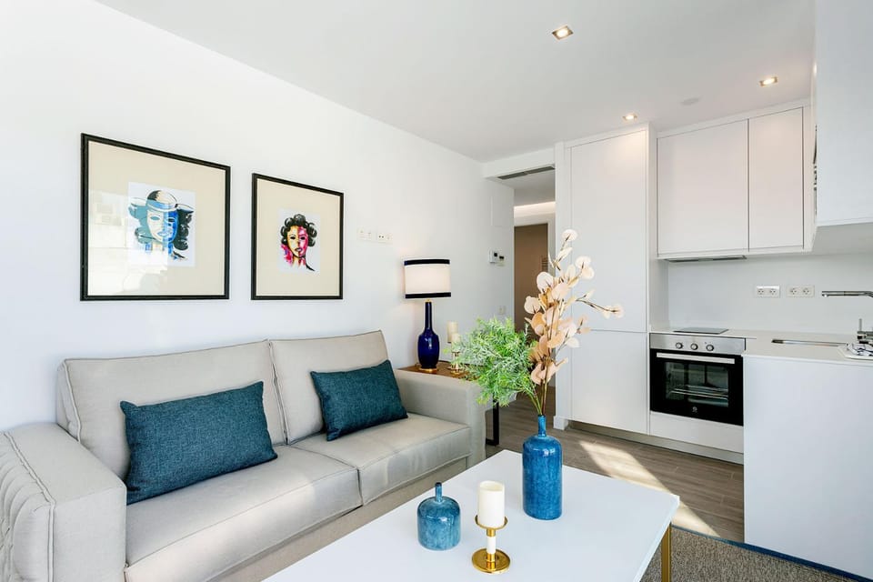 Kitchen or kitchenette, Living room, Seating area, Dining area, dishwasher, oven, stove, toaster